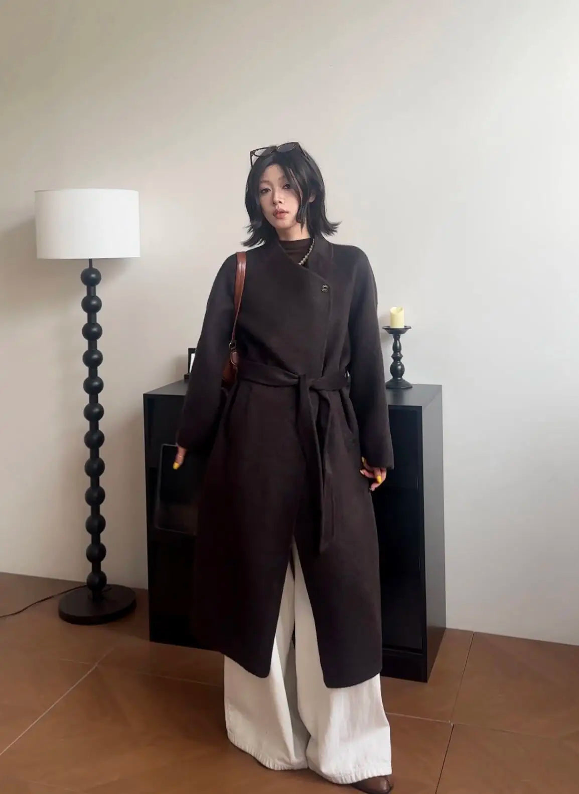 Casaco feminino em lã tom damasco.